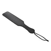 Black leather paddle with a wrist strap.