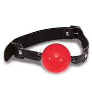 Red soft rubber ball gag with an adjustable black strap.
