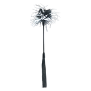 Black and white feather tickler with a black tassel and handle.