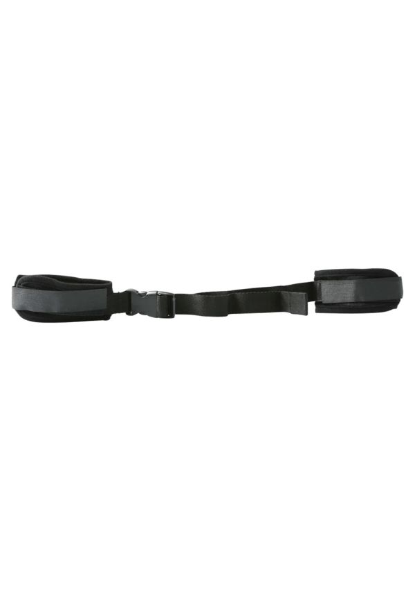 Adjustable black fabric bondage cuffs with a buckle.