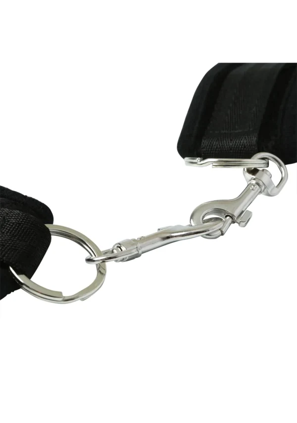 Black soft velcro cuffs with metal clasp and ring.