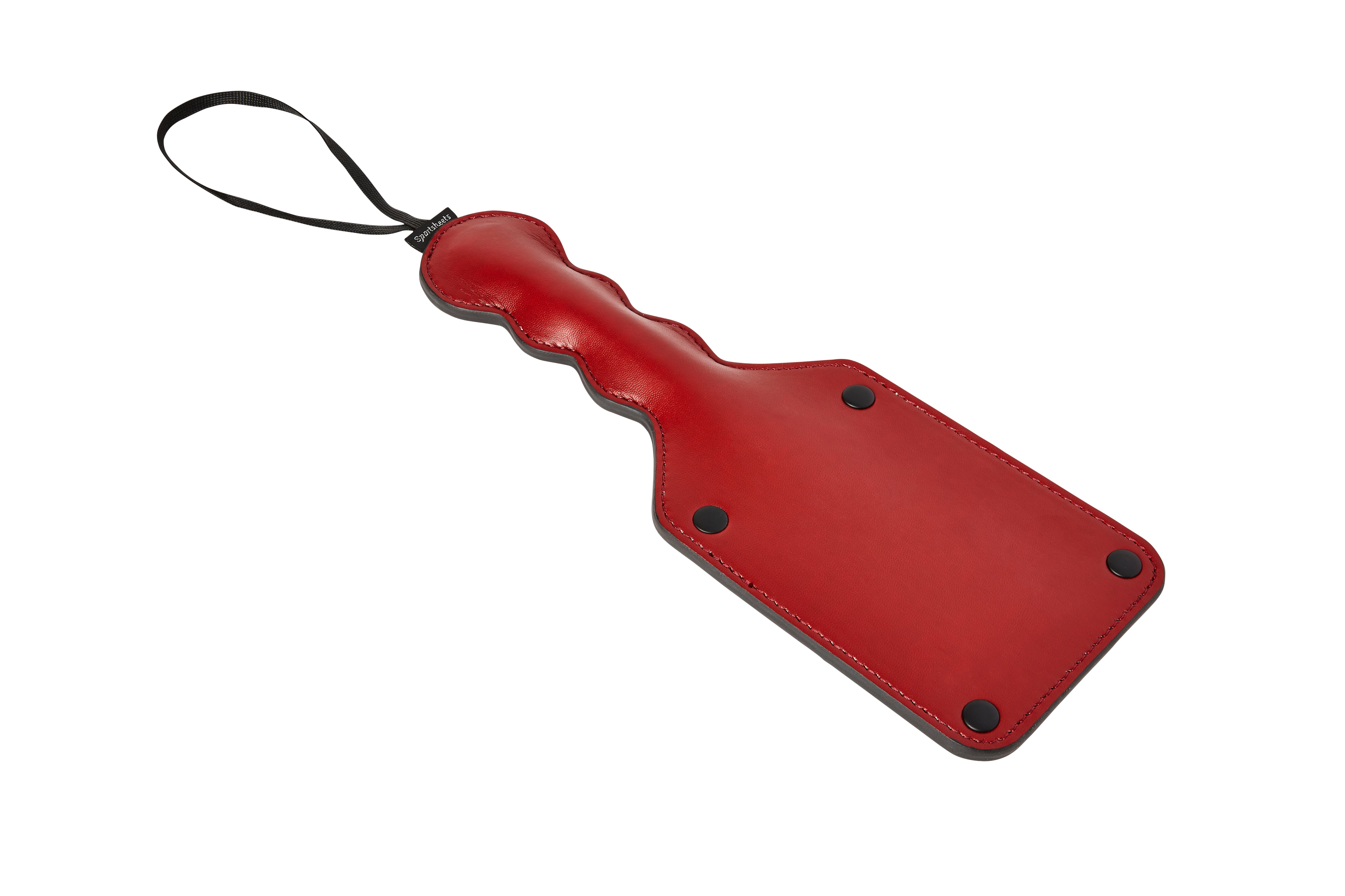 Red vegan leather paddle with a black wrist loop.