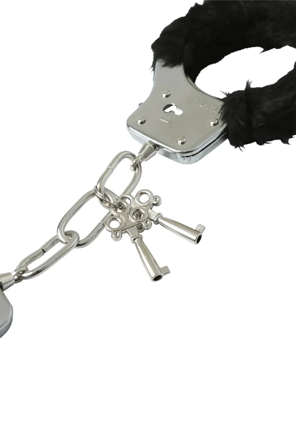Black fur-lined handcuffs with three silver keys.