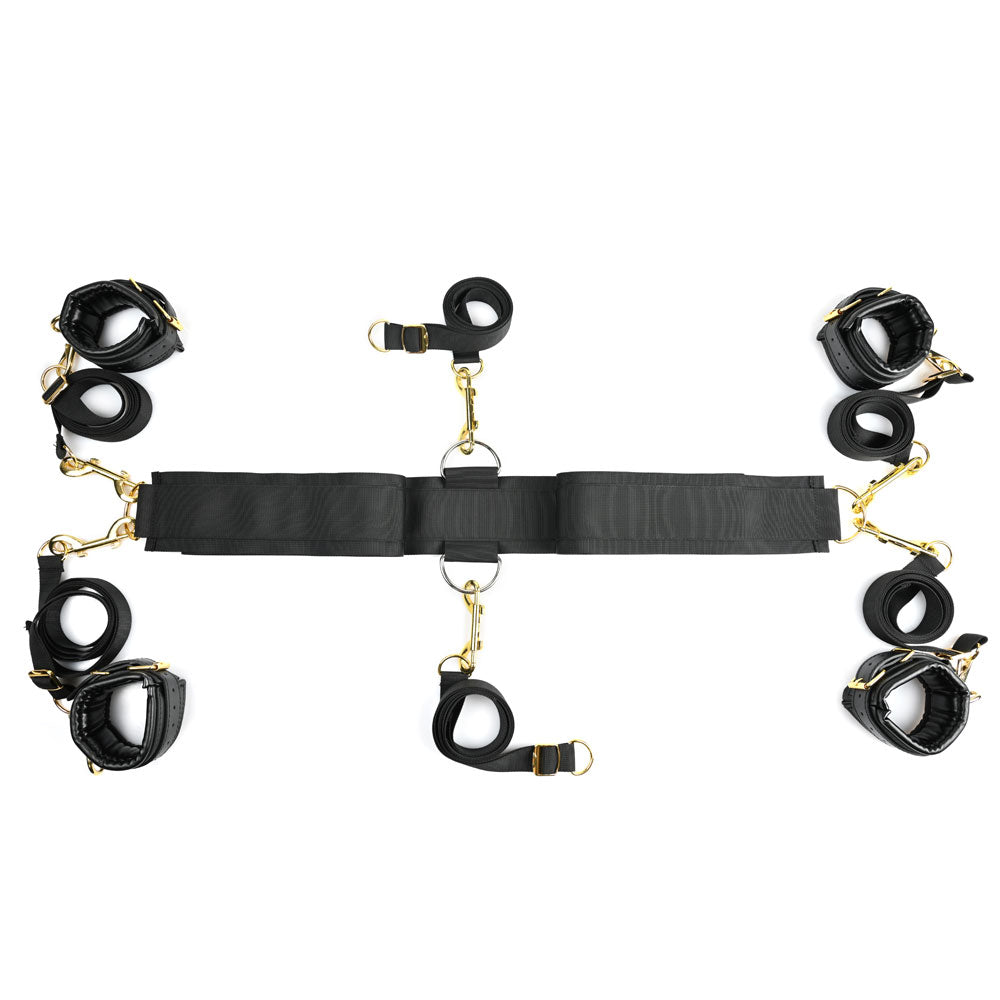 Black restraint set with faux leather cuffs and gold hardware.