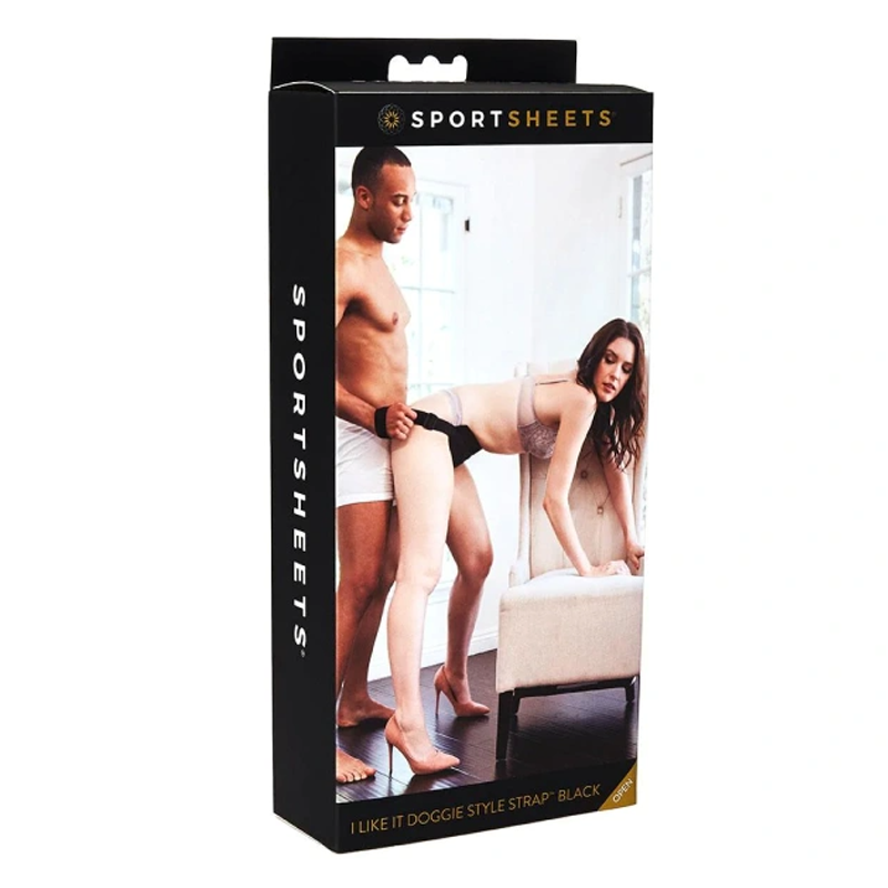 Sportsheets I Like It Doggie Style strap in black, shown on a box with a couple.