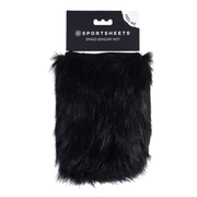 Black faux fur spiked sensory mitt with a black card backing.