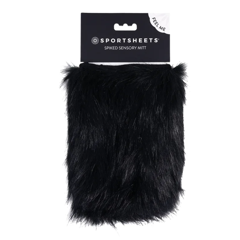 Black faux fur spiked sensory mitt with a black card backing.
