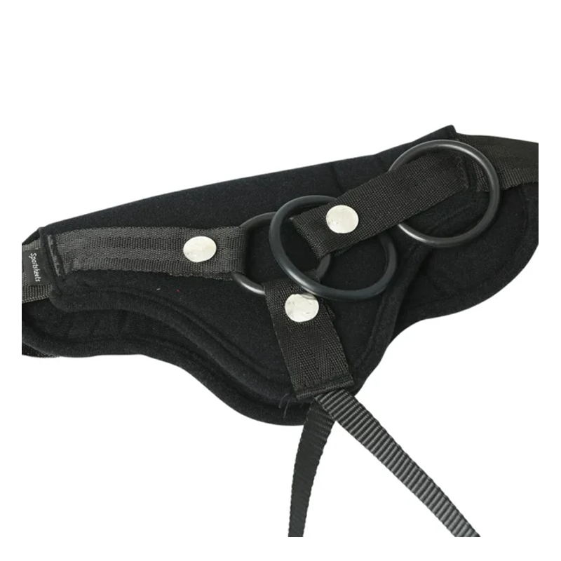 Black adjustable strap-on harness with metal rings and straps.