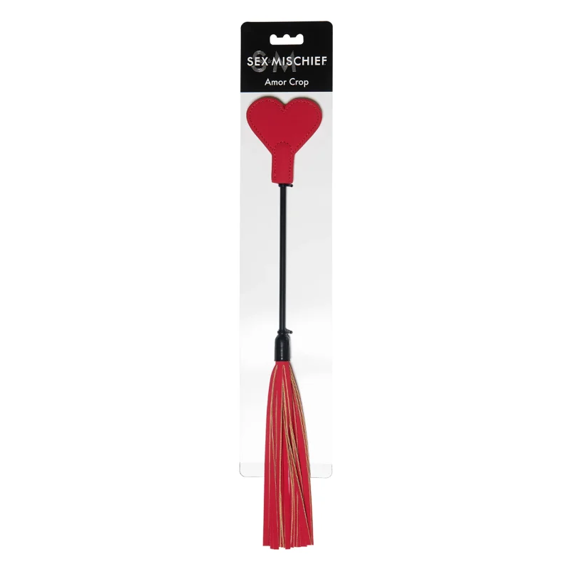 Red faux leather mini flogger with a heart-shaped paddle and tassel.