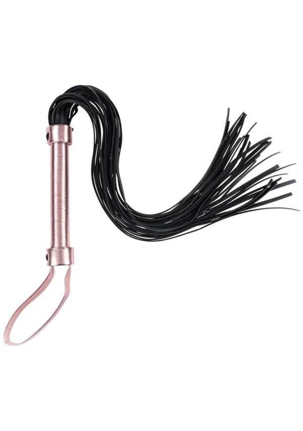 Rose gold flogger with black faux leather falls and a wrist loop.