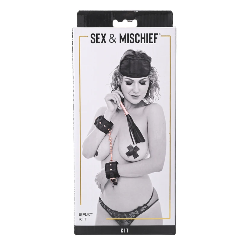 Brat Kit BDSM restraint set with flogger in rose gold.