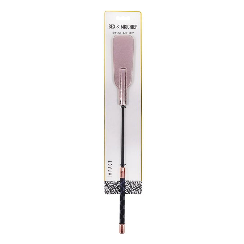 Rose gold vegan leather brat crop impact whip with black handle.