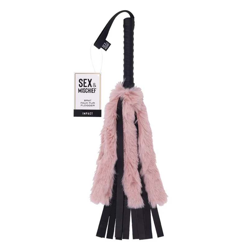 A rose gold handle flogger with pink faux fur and black vegan leather falls.