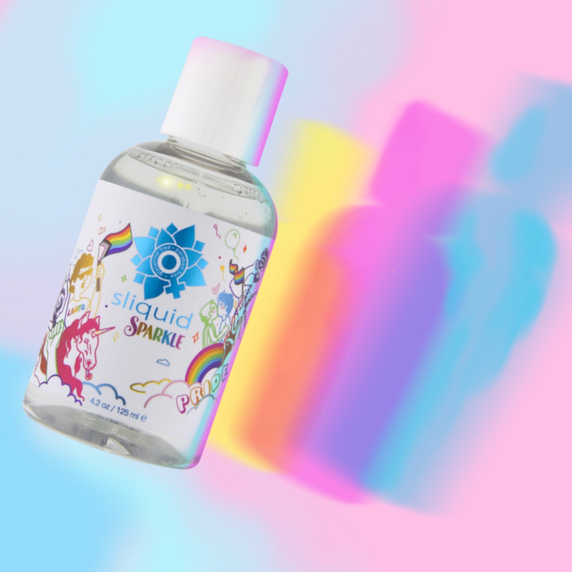Sliquid Sparkle Pride lube bottle with rainbow and unicorn illustrations.
