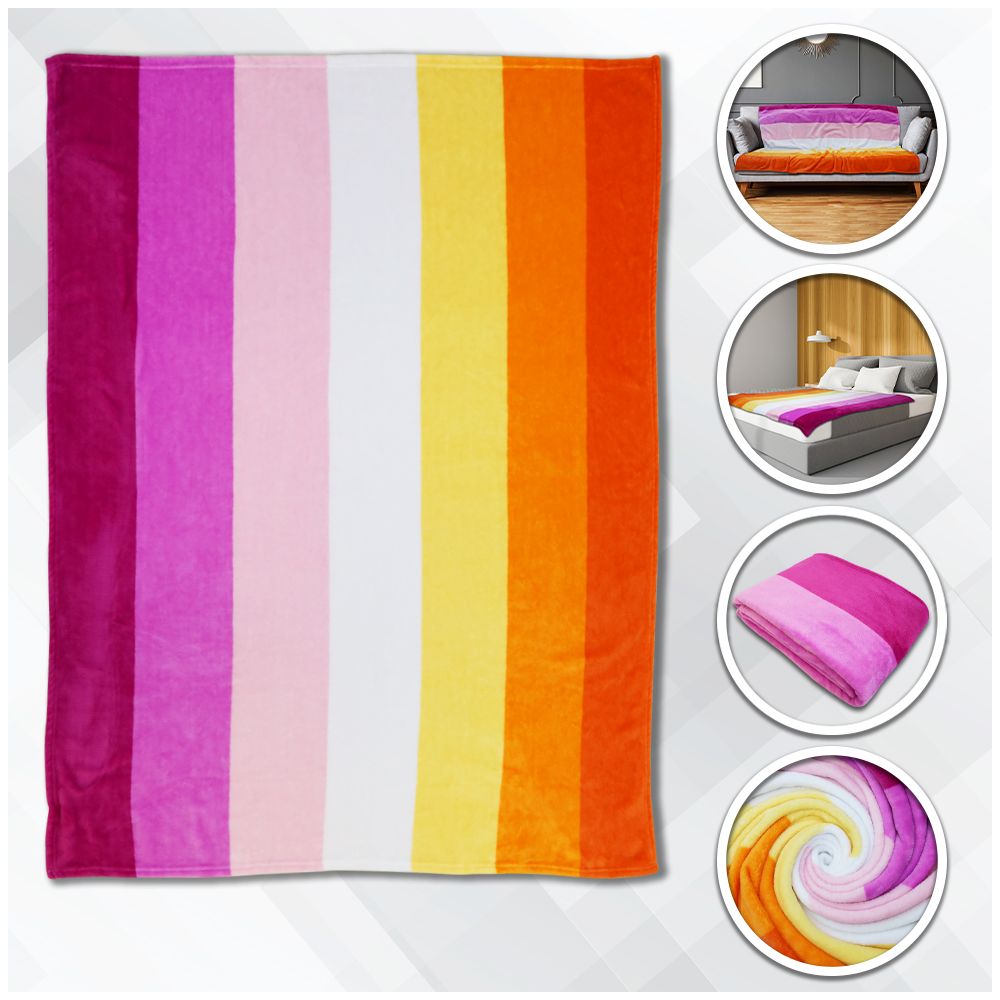 A plush fleece blanket with vertical stripes in shades of pink, white, yellow, and orange.
