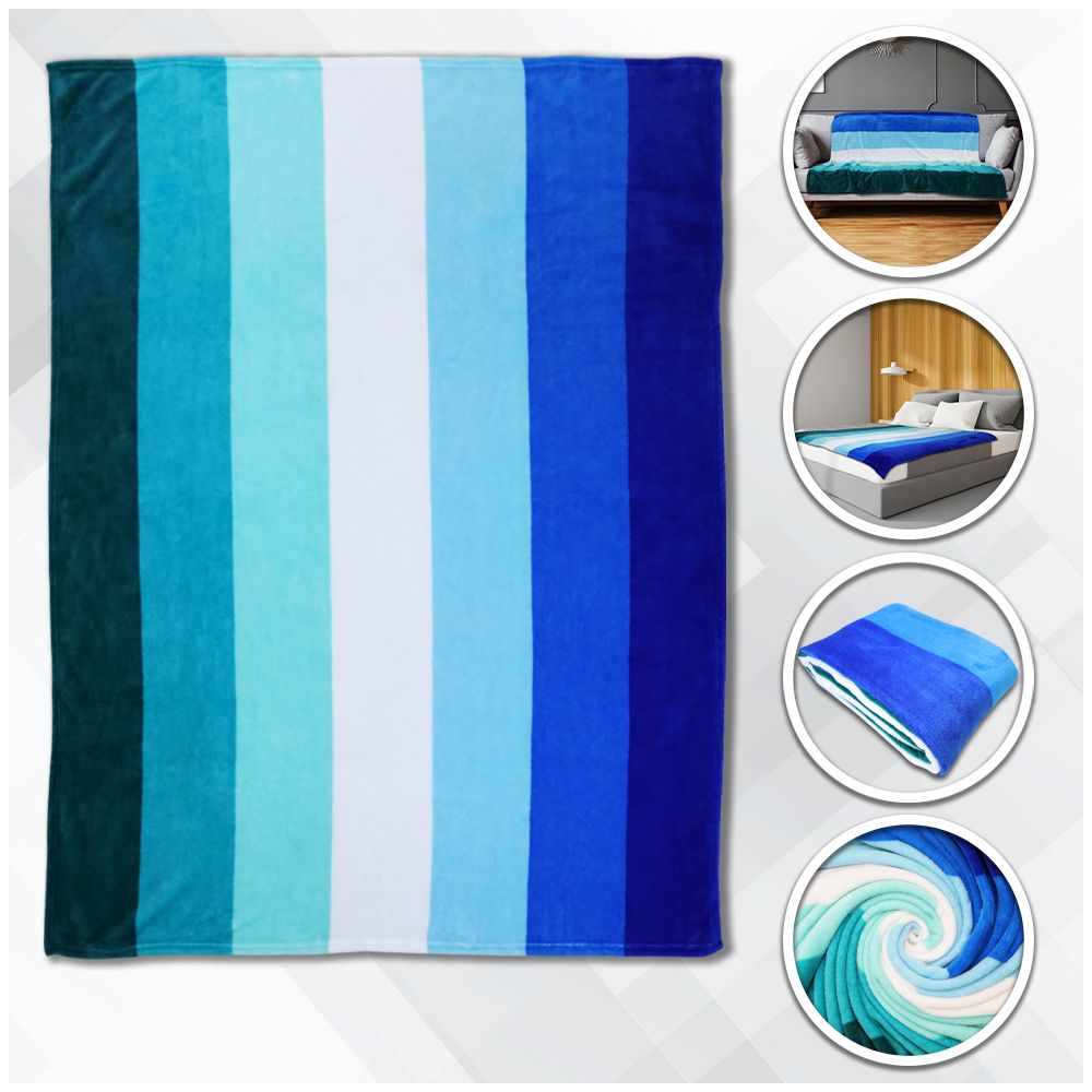 A soft plush blanket with vertical stripes in shades of blue and teal.