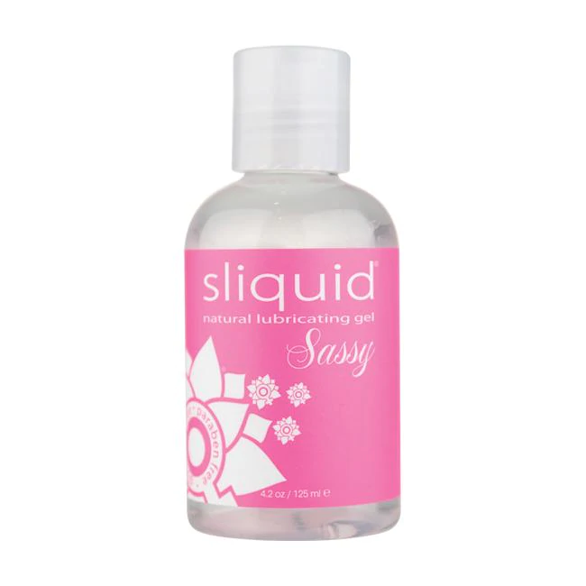 Sliquid Sassy natural lubricating gel in a clear bottle with a pink label.
