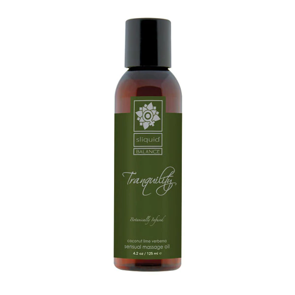 Sliquid Tranquility massage oil in a brown bottle with a green label.