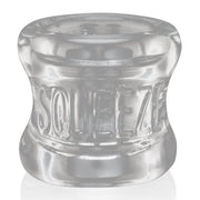 Clear FLEXtpr ergonomic ball stretcher with the word "Squeeze" embossed.