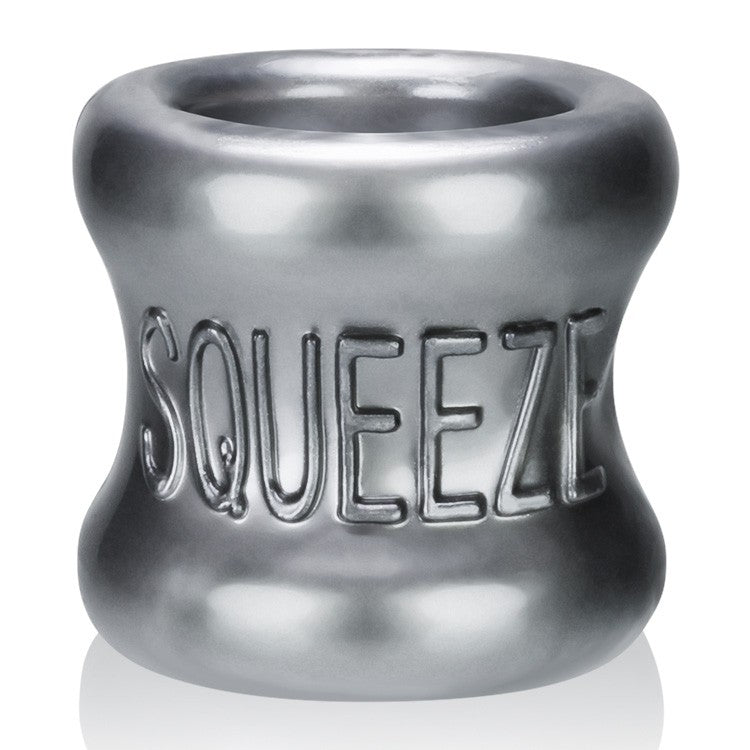 A steel grey ball stretcher with the word "Squeeze" embossed on it.