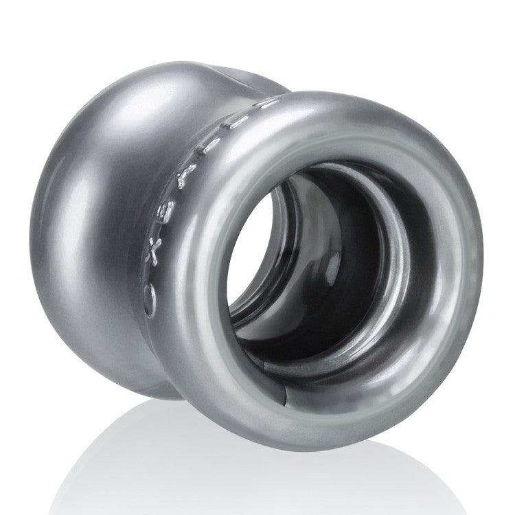 Steel grey FLEXtpr ball stretcher with a unique hourglass shape and inner rings.