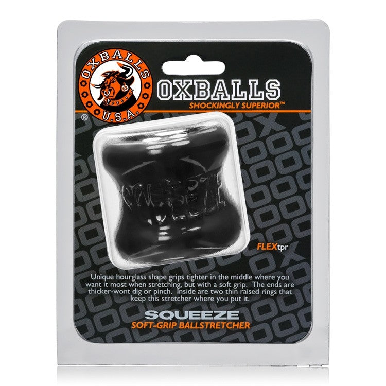 Black OXBALLS Squeeze ball stretcher made of soft FLEXtpr.