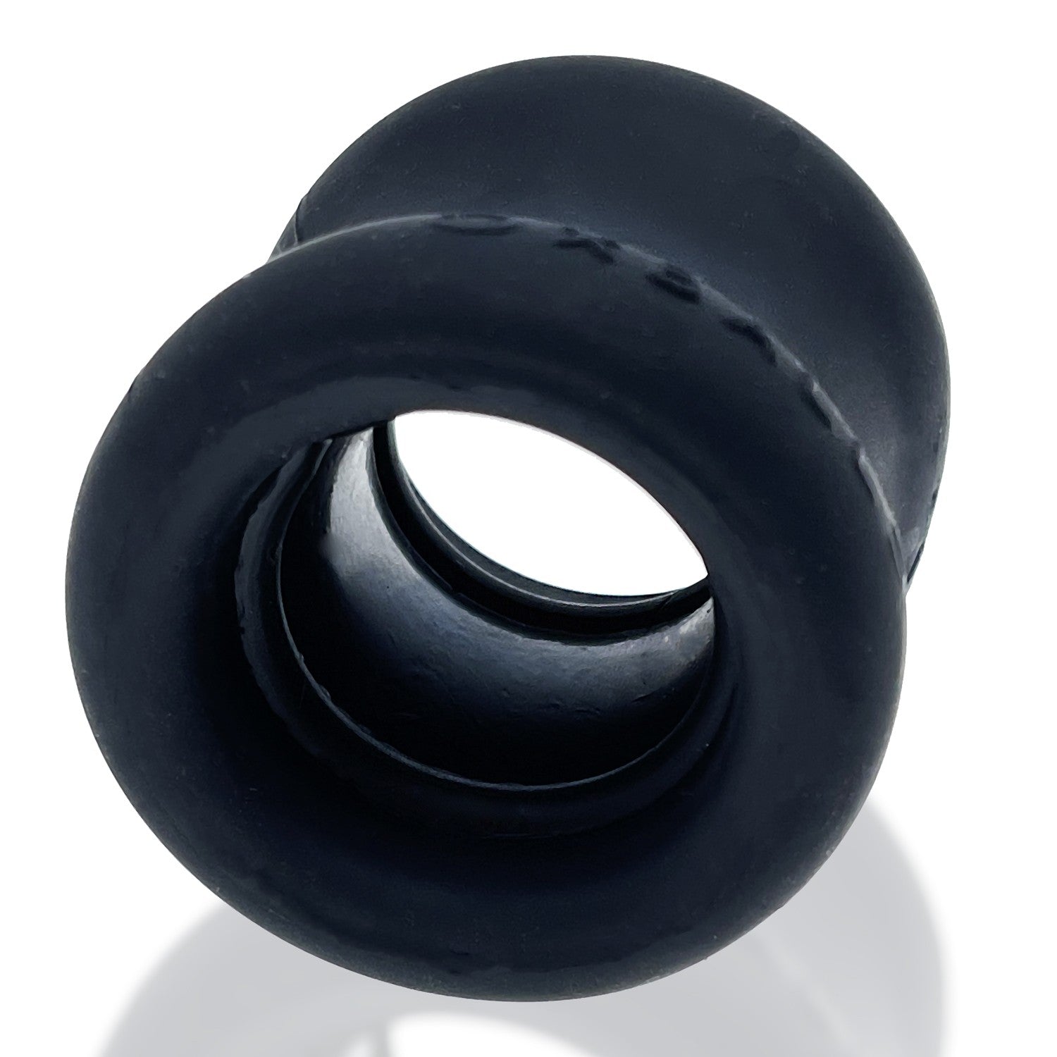 Black FLEXtpr ball stretcher with a soft, flexible texture and hourglass shape.