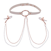 Faux leather collar with rose gold ring, pearl chains, and adjustable nipple clamps.