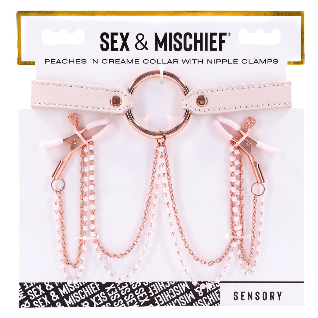 Faux leather collar with rose gold hardware, pearl chains, and adjustable nipple clamps.