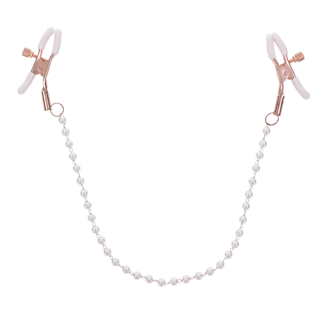 Rose gold nipple clamps with a pearl chain.