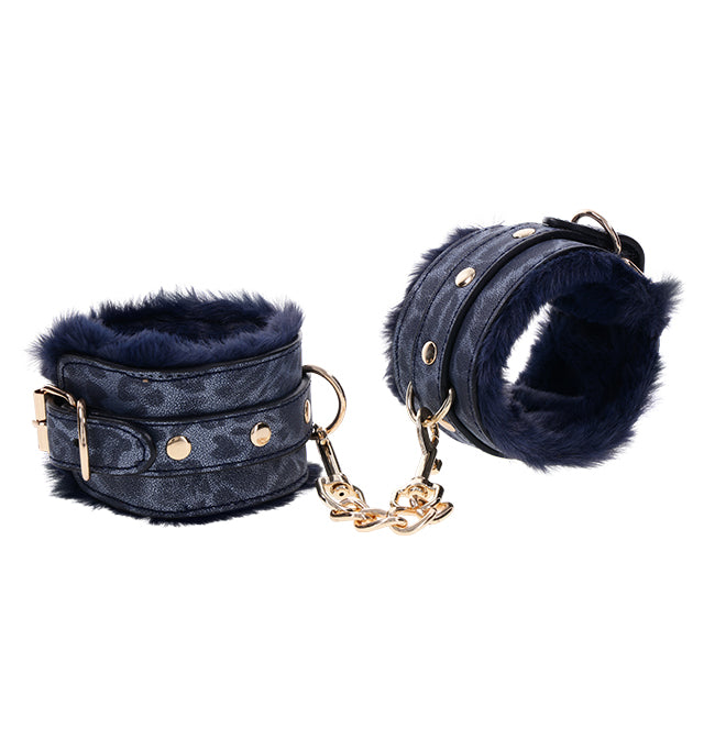 Navy faux fur lined cuffs with gold hardware and chain.
