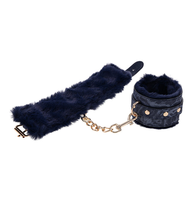 Navy faux fur lined handcuffs with gold chain and hardware.