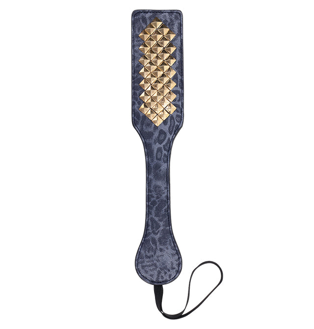 Blue leopard print faux leather paddle with gold studs and a wrist loop.