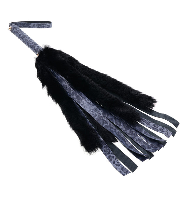 Navy blue faux fur and leather flogger with leopard print accents.