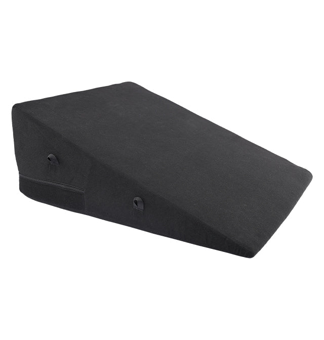 Black foam wedge with restraint loops.
