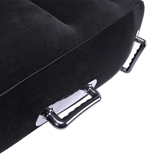 Black inflatable ramp positioner with velvet cover and chrome handles.
