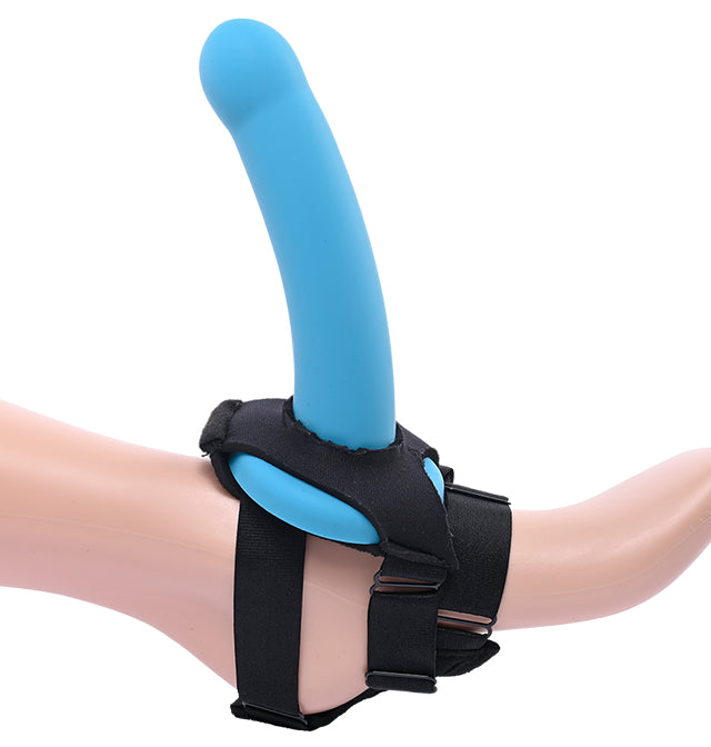 Blue silicone dildo attached to a black neoprene foot harness strap for solo use.