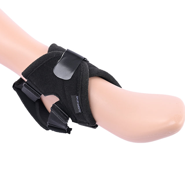 Black foot strap-on harness with adjustable straps.