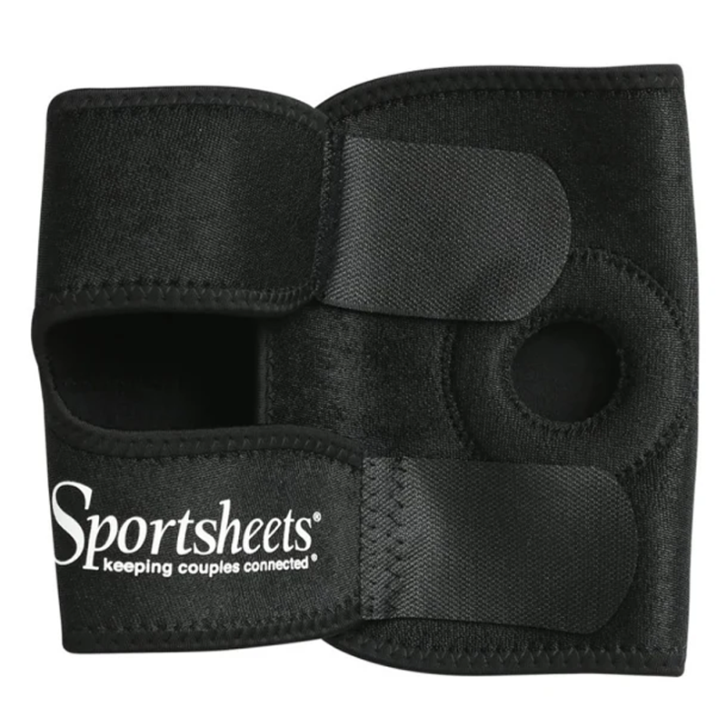 Black thigh strap-on harness with neoprene lining and adjustable straps.