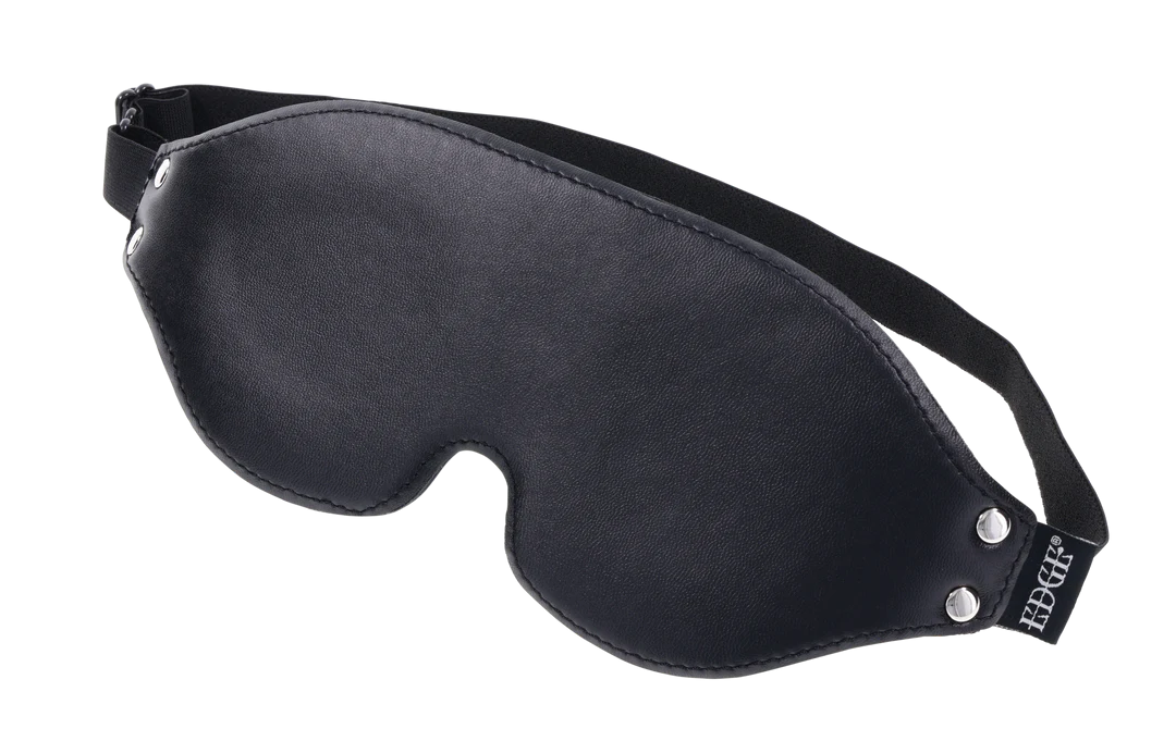 Black faux leather blindfold with adjustable strap and memory foam.