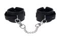 Black padded adjustable handcuffs with metal chain and clasps.