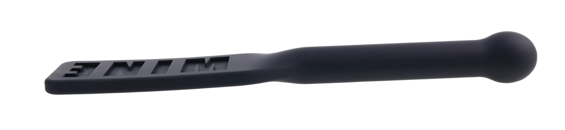 Black silicone paddle with "MINE" embossed on the flat end and an insertable handle.