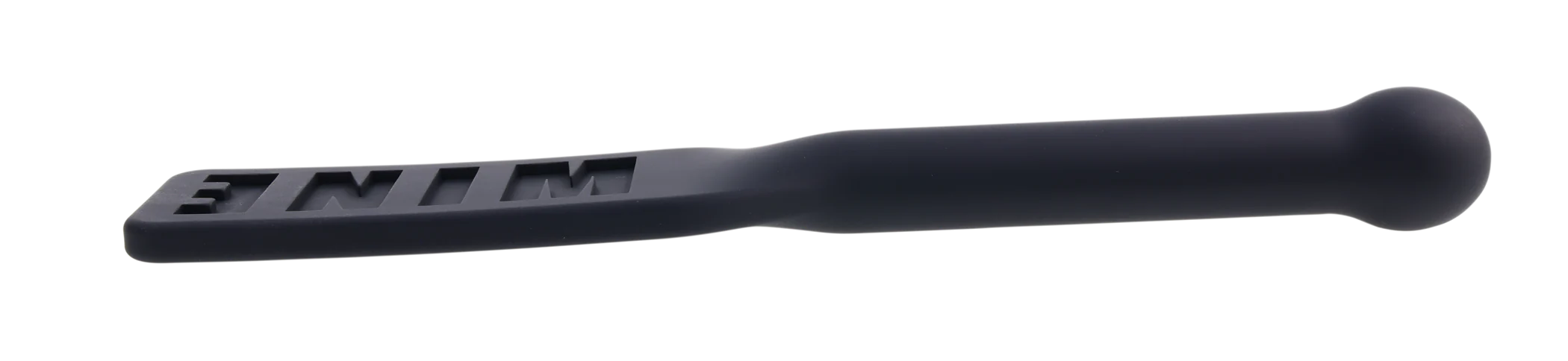 Black silicone paddle with "MINE" embossed on the flat end and an insertable handle.