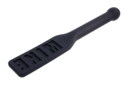 Black silicone paddle with "MINE" embossed on the surface and a rounded handle.