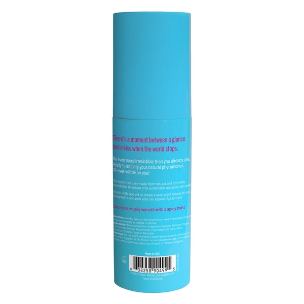 A blue spray bottle of Pheromone Body Mist with text describing its musky fragrance.