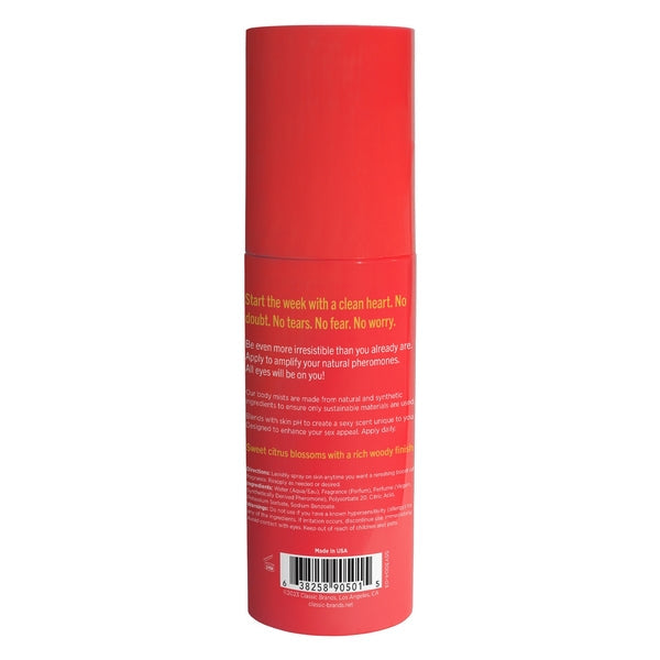 Red spray bottle with text describing a citrus and woody pheromone body mist.