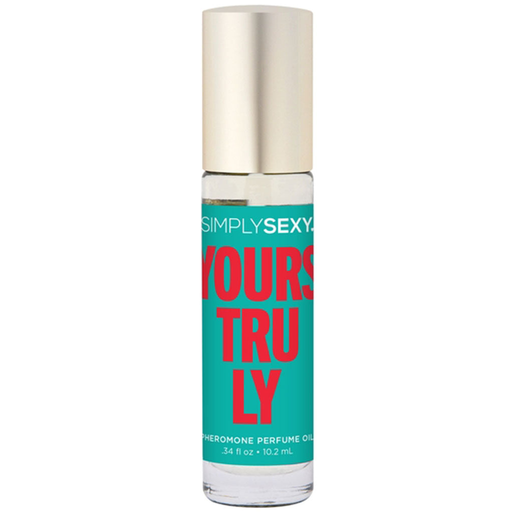 Simply Sexy Yours Truly pheromone perfume oil in a clear rollerball bottle with a gold cap.