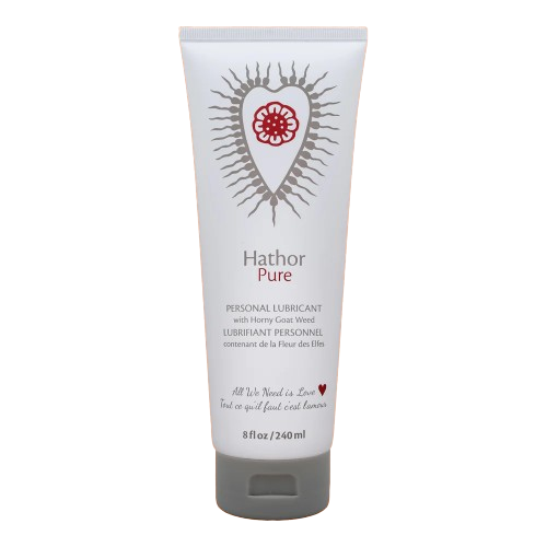 Hathor Pure personal lubricant in a white tube with a red floral heart design.