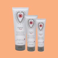 Three tubes of Hathor Pure personal lubricant in different sizes.