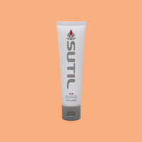 A white tube of Sutil Luxe personal lubricant with a grey cap.
